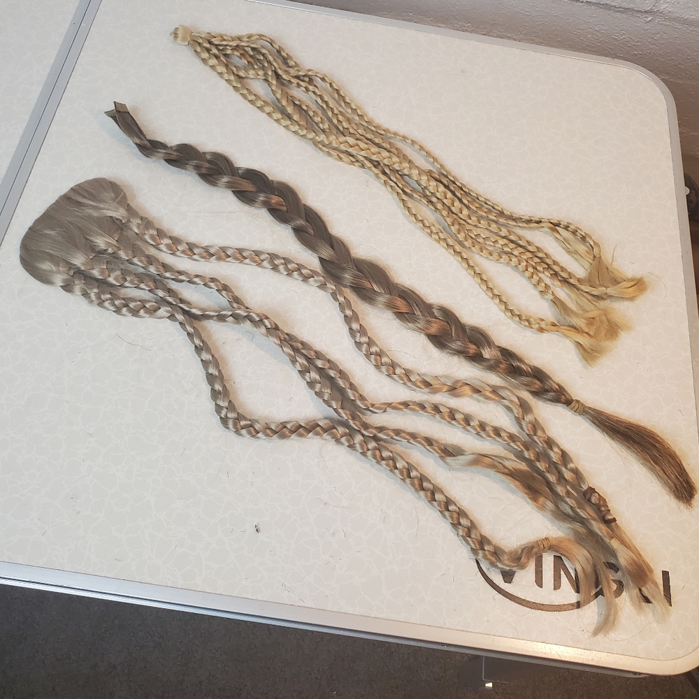Synthetic braids, assorted blonds.